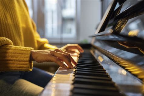 Decoding the Musical Language of Dreams: Unveiling the Meaning Behind the Harmonies of an Ebony Piano