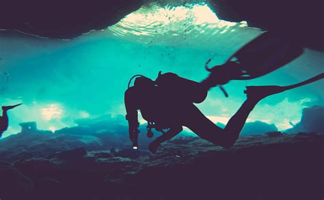 Delving into the Thrilling Realm of Underwater Cave Diving and Exploration