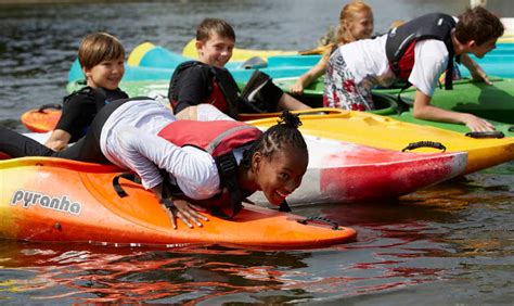 Engaging in Water Sports and Outdoor Activities as a Unit