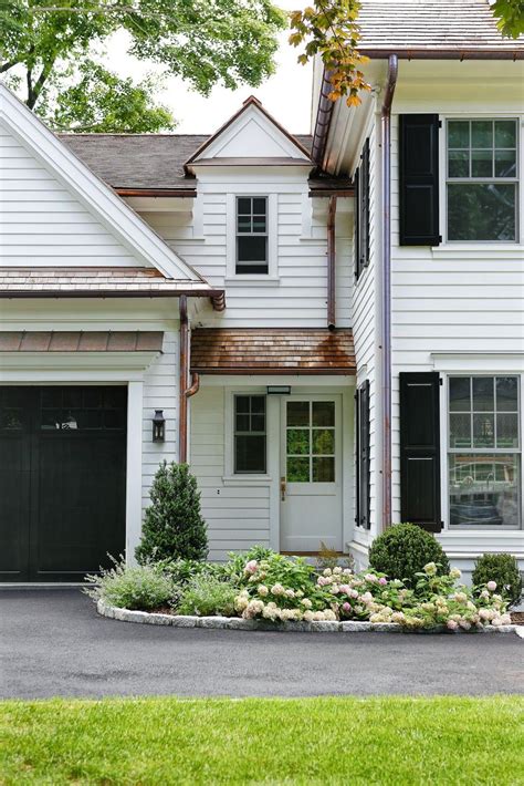 Enhancing Curb Appeal through Garage Door Design and Color Choice