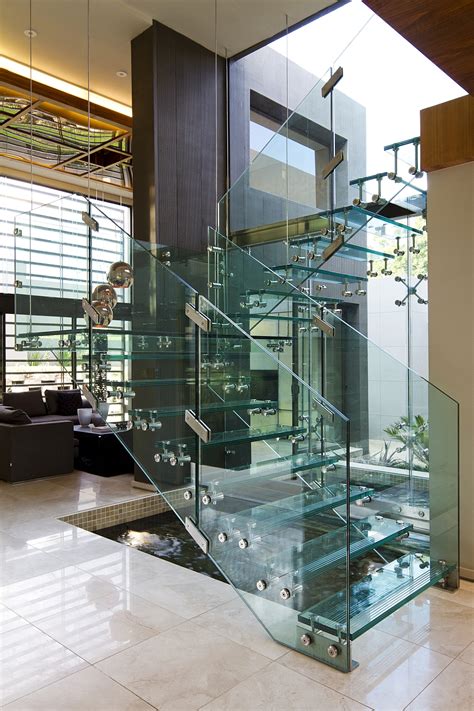 Glass Stairs as a Symbol of Modernity: Embracing Minimalism and Transparency