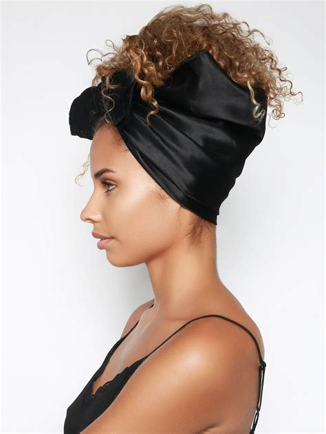 Pairing a Stylish Black Head Scarf with Eye-catching Statement Jewelry