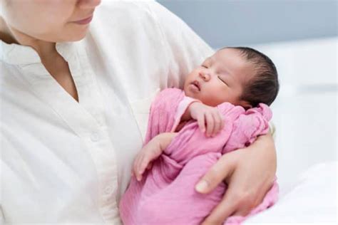 Possible Reasons for Dreaming of a Spouse Holding an Infant