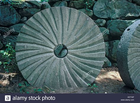 The Cultural Significance of a Millstone: Unveiling the Meaning Behind Dreams Associated with Traditional Grain Processing