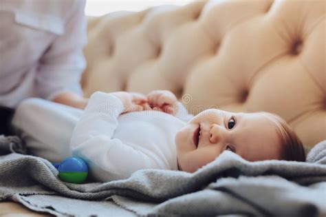 The Impact of a Delighted Infant on Spreading Happiness