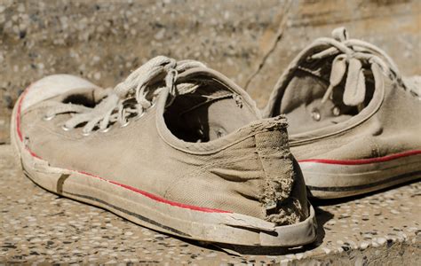 The Journey Begins: Exploring the Symbol of Worn-Out Footwear