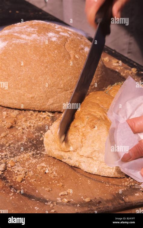 The Significance of Grasping the Loaf: A Representation of Sustenance and Contentment