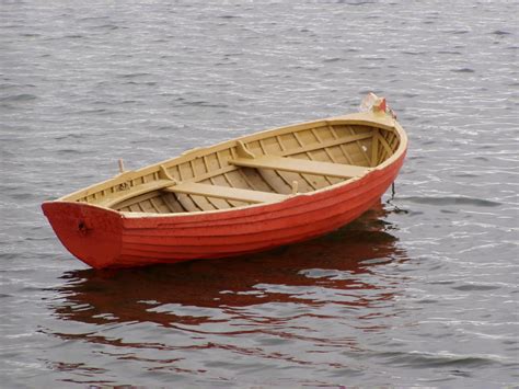 Unraveling the Symbolic Significance of a Crimson Canoe