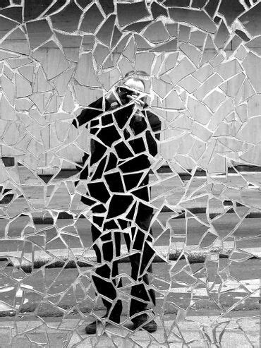 Unveiling the Significance of Fragmented Glass as a Reflection of Personal Insecurities